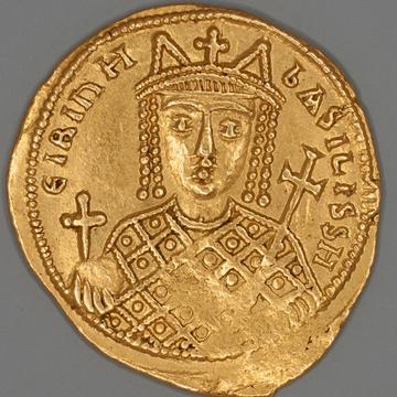 gold coin showing woman as the central image